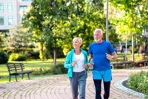 Older couple jogging