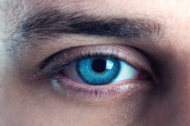 Close up of male blue eye