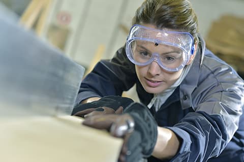 Woman wearing safety glasses